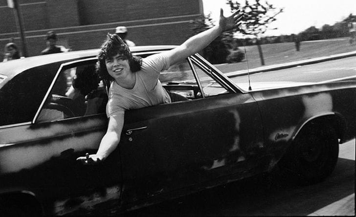 70s teen hanging out car window